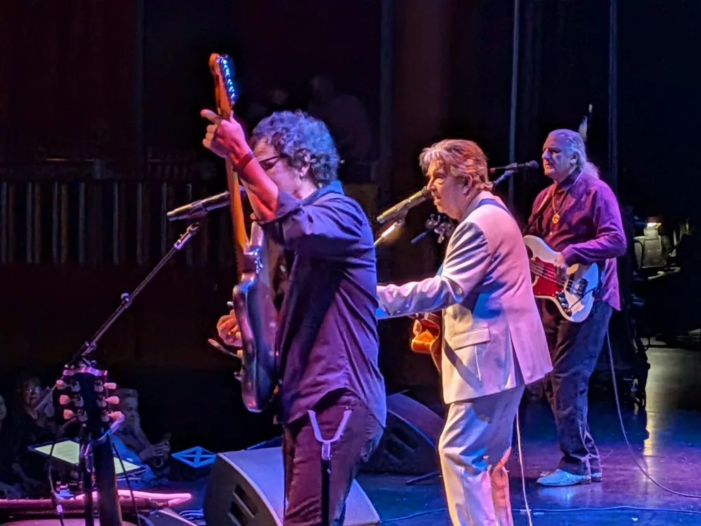 Guitarist Rob Bonfiglio, Guitarist and Vocalist, Terry Sylvester of The Hollies, and Bassist Bill in the background.