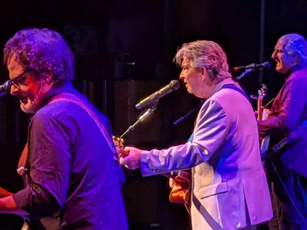 Guitarist Rob Bonfiglio, Guitarist and Vocalist, Terry Sylvester of The Hollies, and Bassist Bill in the background.