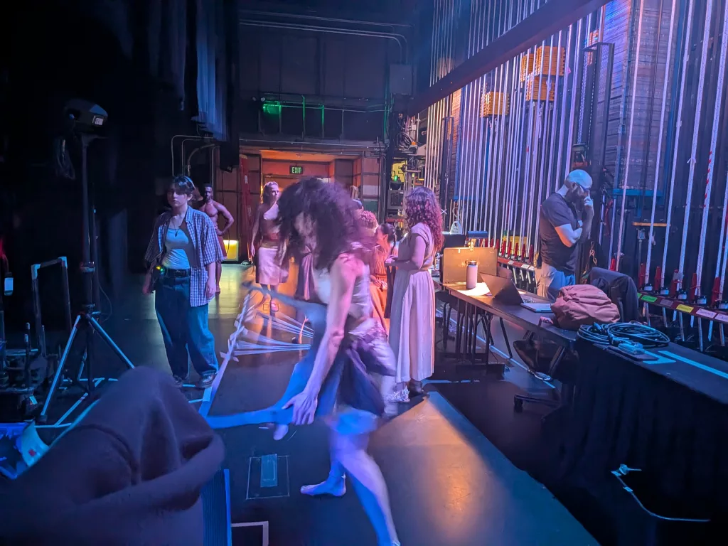 Backstage in the stage left wing. 